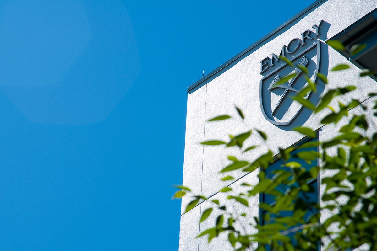 corner of white roofline with Emory University logo