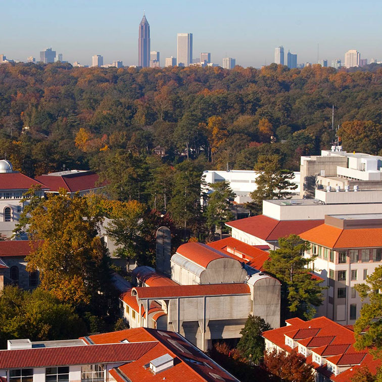 an aerial shot of downtown Atlanta with Emory campus in the foreground