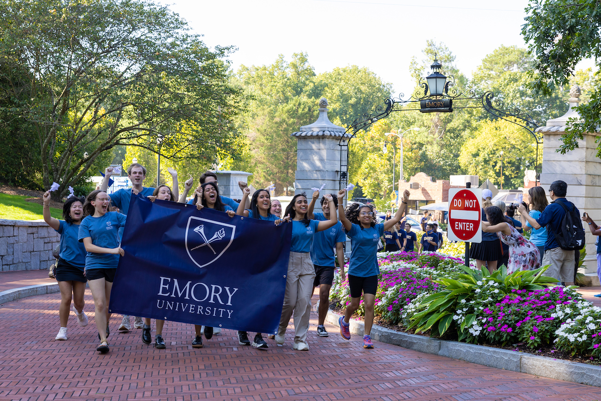 Emory students at gate crossing